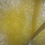 Boiling butter in ghee recipe.
