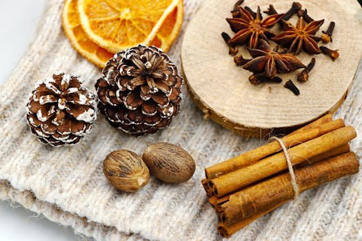 Whole nutmeg with cinnamon sticks and star anise arranged on a rustic surface, showing warm, aromatic spices used for digestion and Ayurvedic wellness.